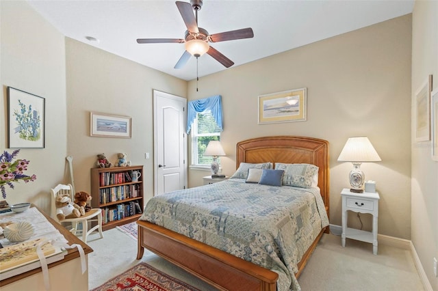 carpeted bedroom with ceiling fan