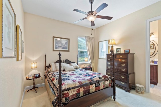 bedroom featuring light carpet and ceiling fan