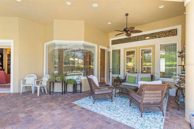 view of patio featuring ceiling fan and an outdoor hangout area