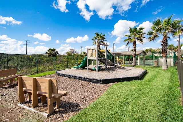 view of playground featuring a lawn