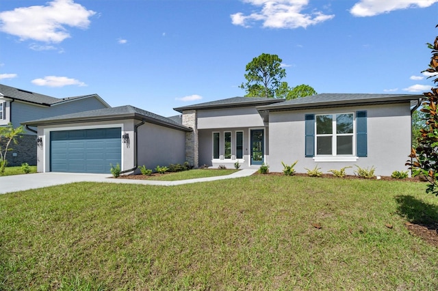 view of front facade featuring a front yard and a garage