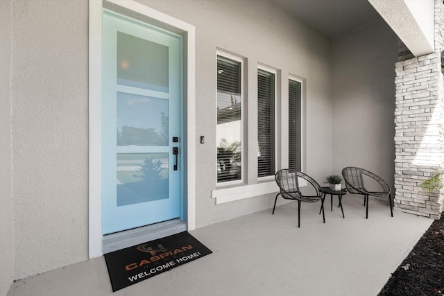 entrance to property with covered porch