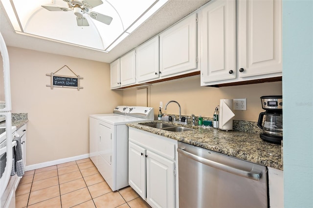 clothes washing area featuring sink, ceiling fan, and light tile flooring