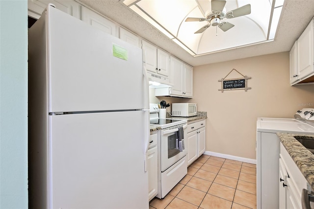 kitchen featuring white cabinets, white appliances, ceiling fan, and light tile floors