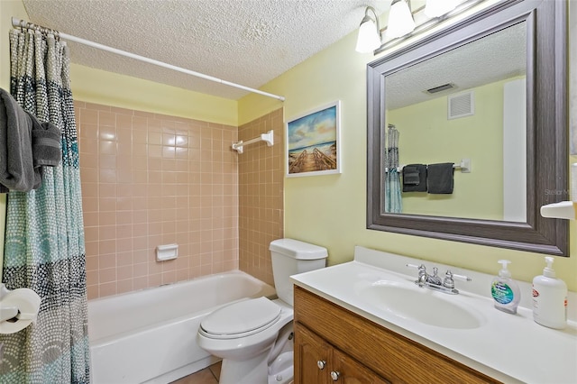 full bathroom with shower / bath combo, vanity, tile flooring, toilet, and a textured ceiling