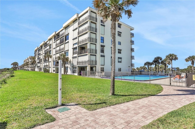 view of property with a community pool