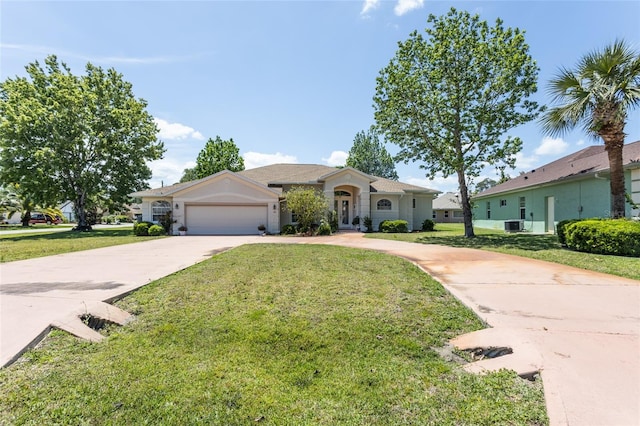 single story home with a front lawn and a garage