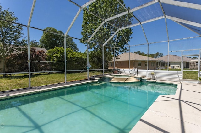 view of swimming pool featuring a yard, a lanai, and a patio