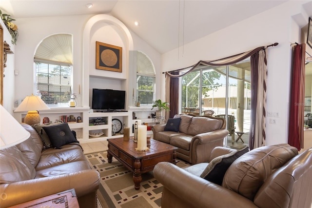 tiled living room featuring high vaulted ceiling and built in features