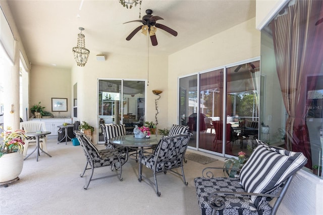 view of patio featuring ceiling fan