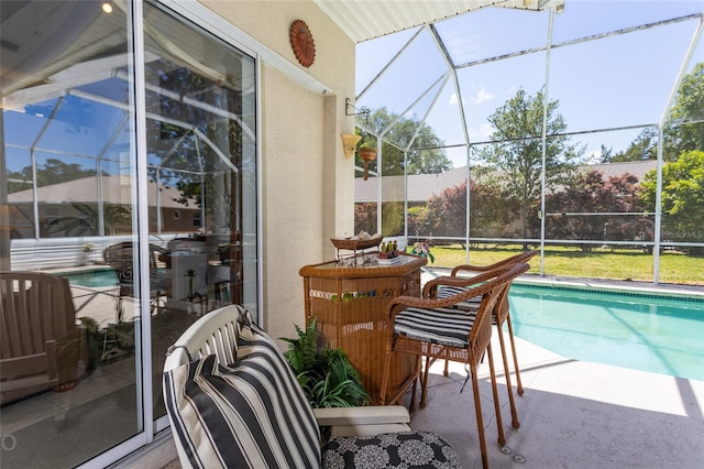 sunroom / solarium featuring vaulted ceiling and plenty of natural light