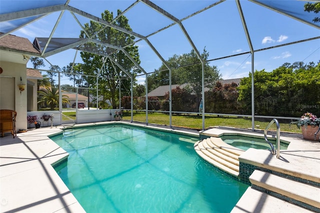 view of swimming pool featuring a patio area, an in ground hot tub, and glass enclosure