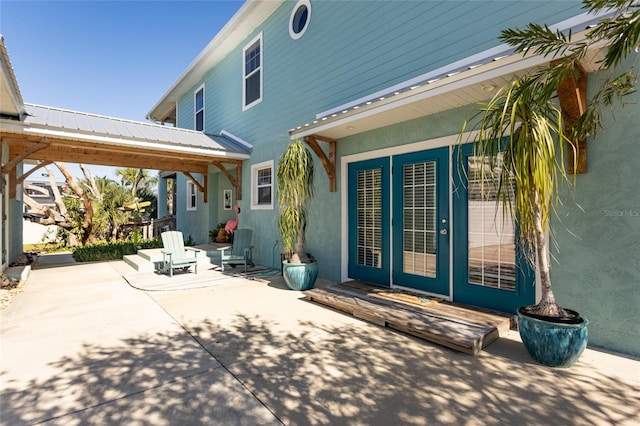 view of patio featuring french doors