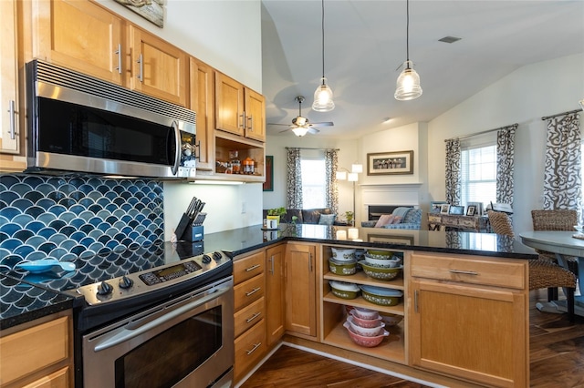 kitchen with appliances with stainless steel finishes, tasteful backsplash, dark hardwood / wood-style flooring, lofted ceiling, and kitchen peninsula