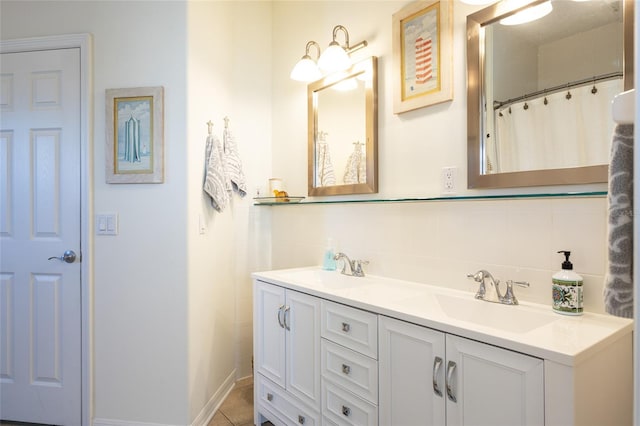 bathroom with backsplash, tile floors, and dual vanity