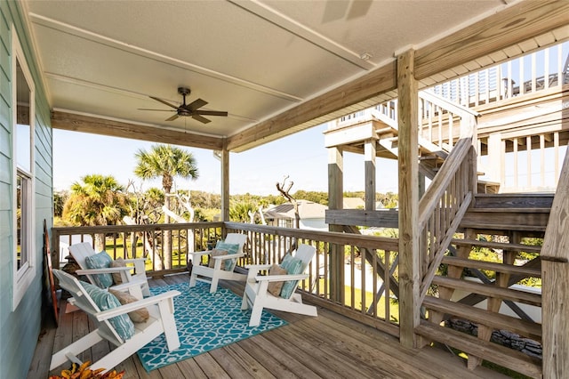 wooden deck with ceiling fan