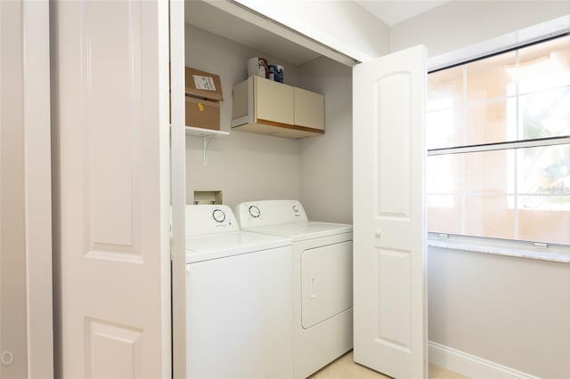 laundry room with washer and dryer