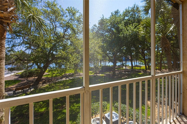 wooden terrace with a water view