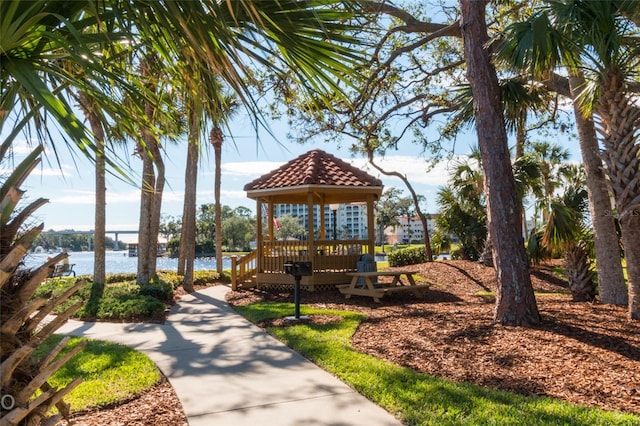 exterior space with a water view and a gazebo