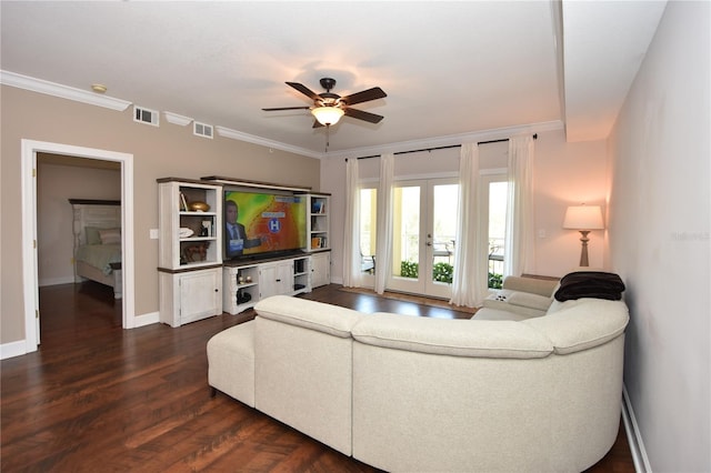 living room with dark hardwood / wood-style floors, french doors, ceiling fan, and crown molding