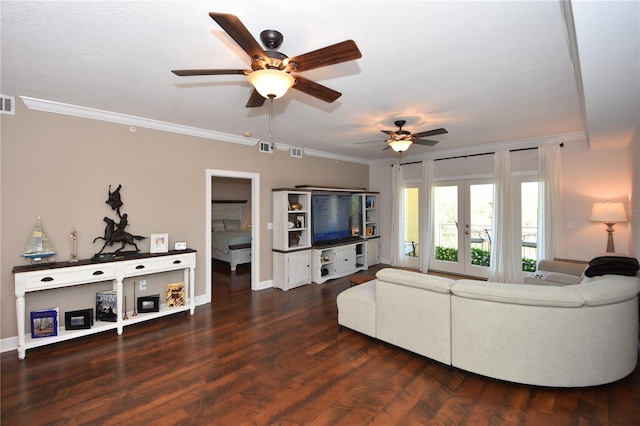 living room featuring ceiling fan, french doors, dark wood-type flooring, and ornamental molding