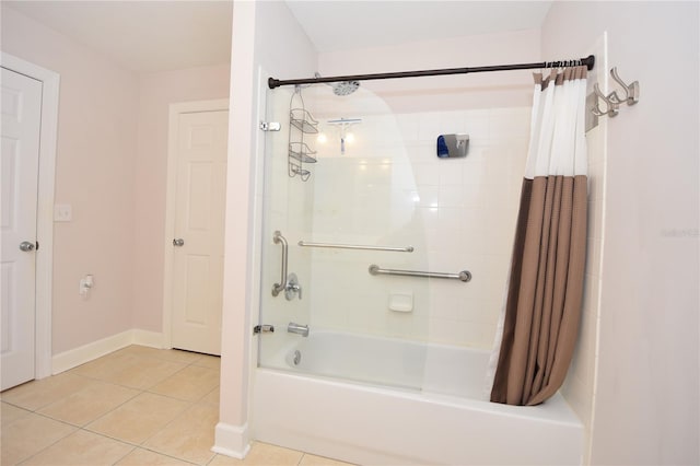 bathroom featuring shower / bath combination with curtain and tile flooring