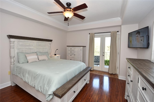 bedroom featuring french doors, ceiling fan, access to outside, a tray ceiling, and dark hardwood / wood-style flooring