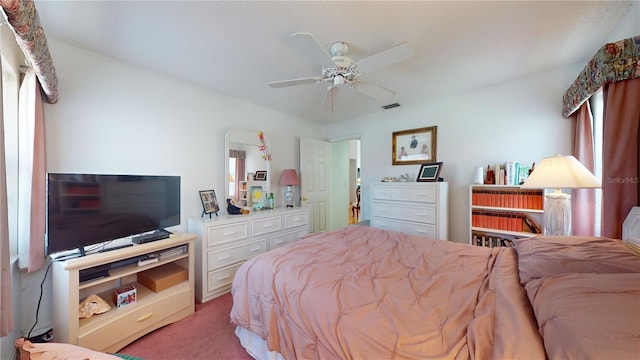 carpeted bedroom with ceiling fan