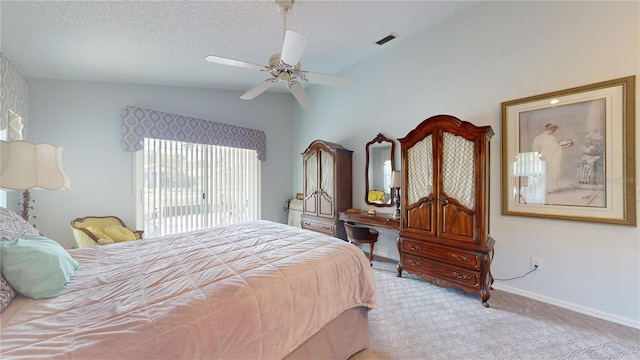 carpeted bedroom with a textured ceiling, ceiling fan, and vaulted ceiling