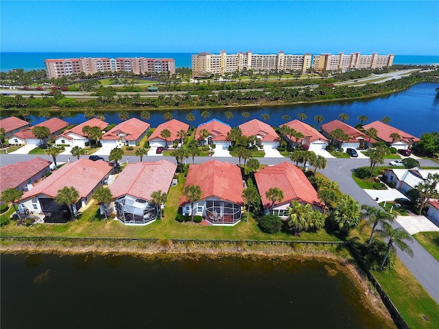 drone / aerial view with a water view