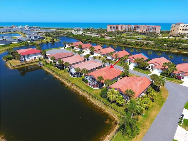 aerial view featuring a water view