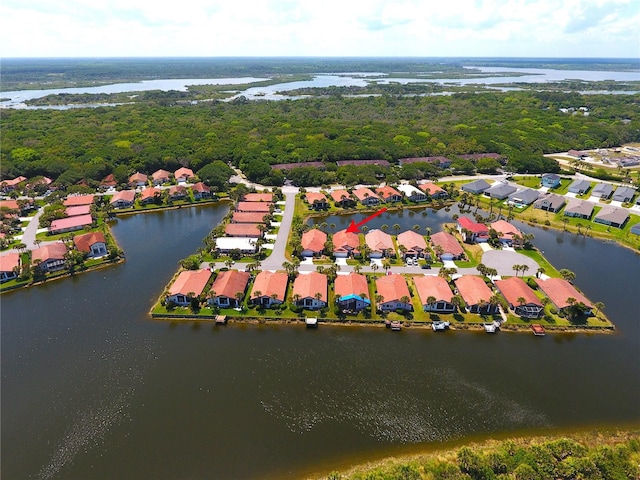 birds eye view of property featuring a water view