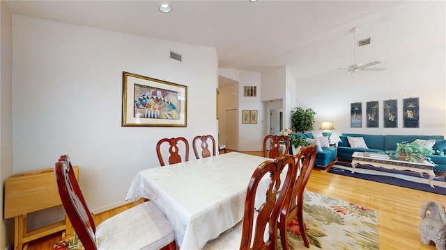 dining room featuring hardwood / wood-style floors and ceiling fan