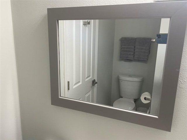 bathroom featuring toilet