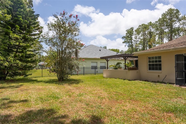 view of yard with a pergola