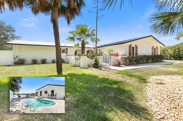3120 John Anderson Dr, Ormond Beach, FL 32176 - view of yard featuring a fenced in pool and a patio