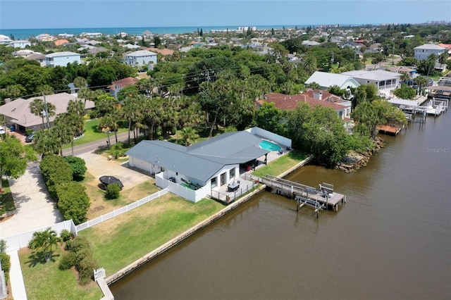 drone / aerial view with a water view