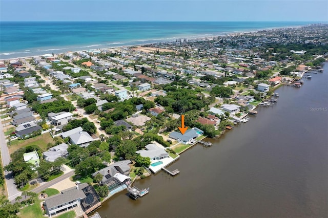 drone / aerial view with a water view