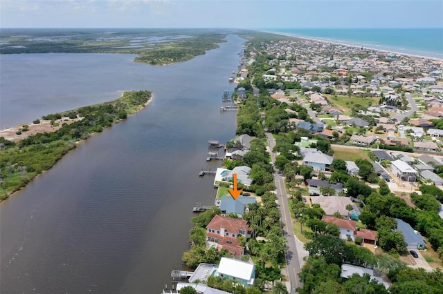 drone / aerial view featuring a water view