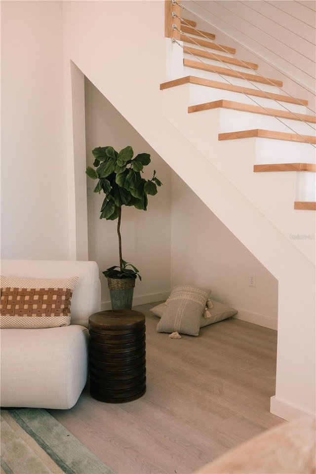 sitting room with hardwood / wood-style floors