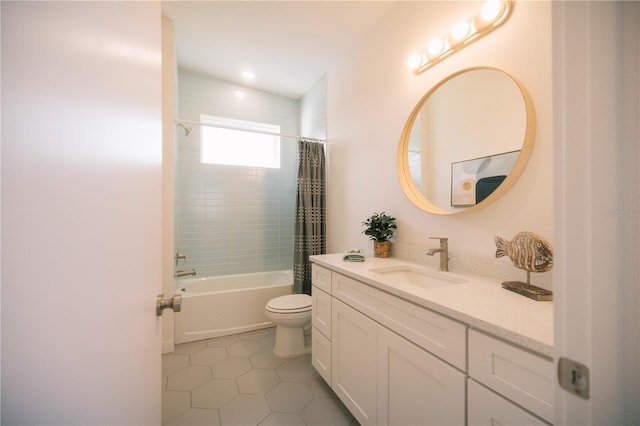 full bathroom featuring tile patterned flooring, shower / bath combination with curtain, vanity, and toilet