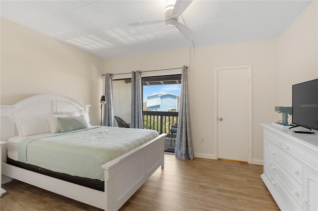 bedroom with ceiling fan, light hardwood / wood-style flooring, and access to exterior