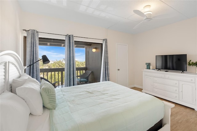 bedroom with ceiling fan, light hardwood / wood-style floors, and access to exterior