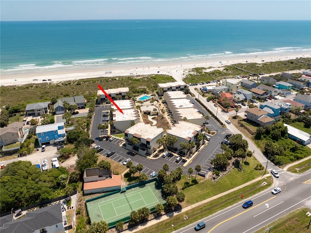 aerial view featuring a water view and a beach view