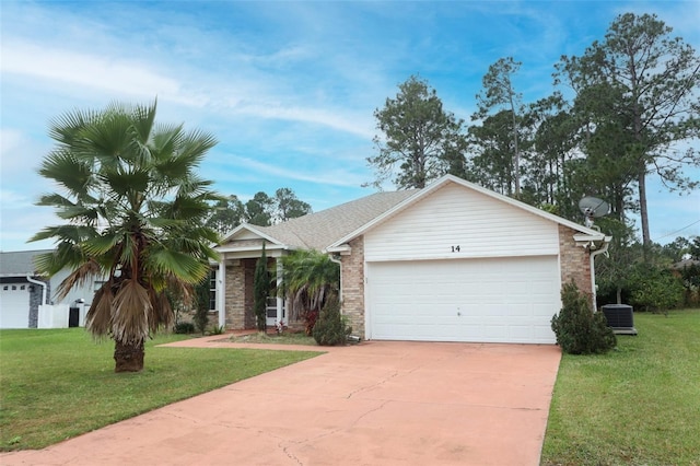 ranch-style home with a garage, a front lawn, and central air condition unit