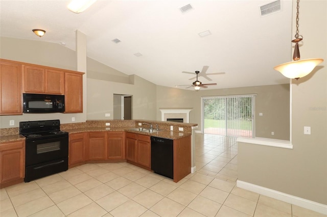 kitchen with light stone countertops, kitchen peninsula, vaulted ceiling, light tile flooring, and black appliances