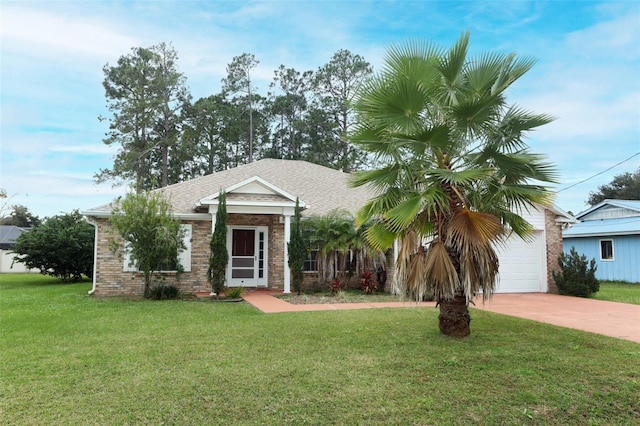 view of front of property featuring a garage and a front yard