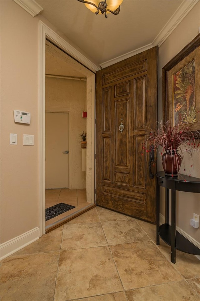 tiled entryway with crown molding