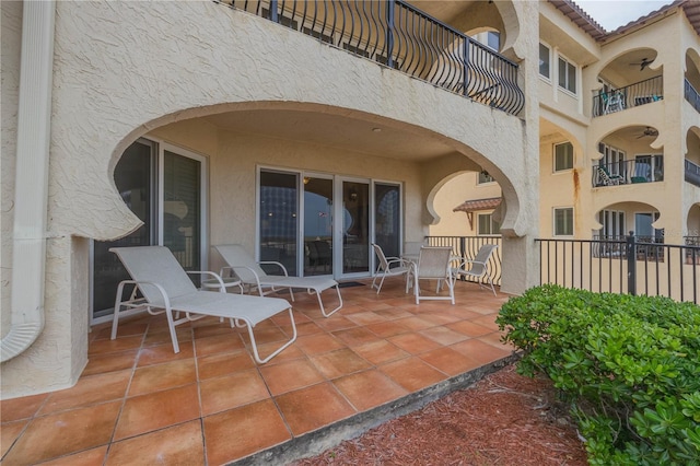 view of patio / terrace with a balcony