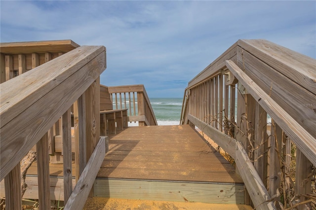 surrounding community featuring a water view